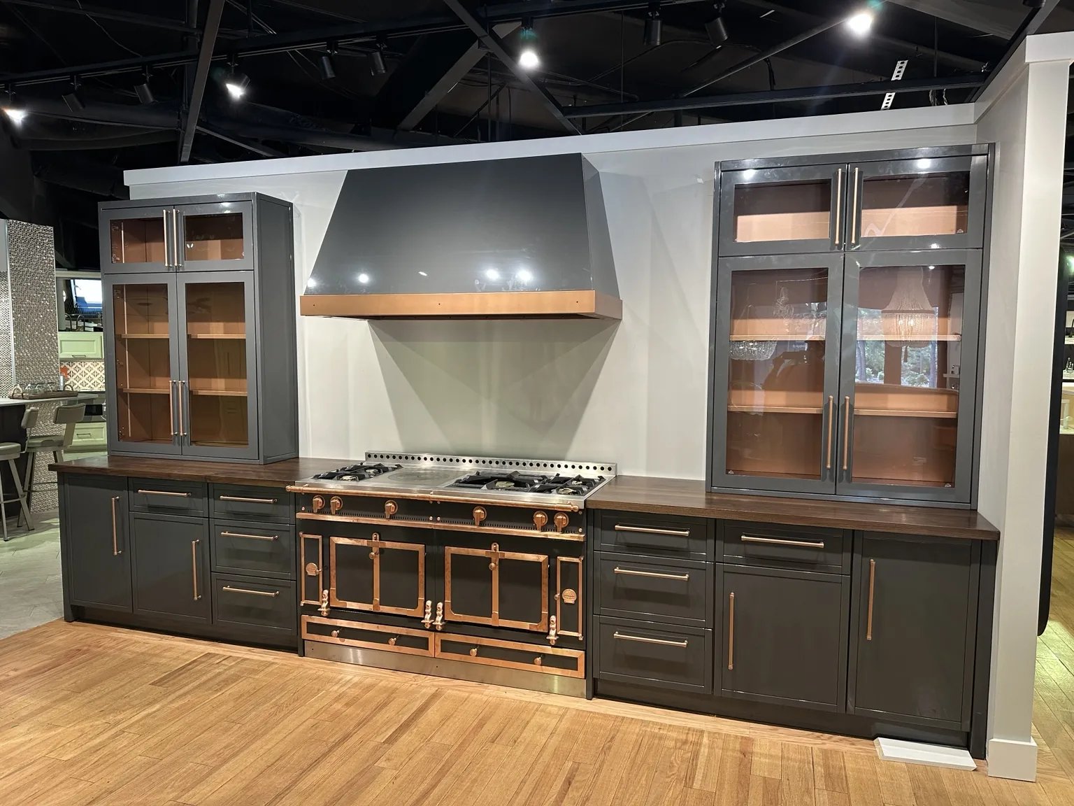 Metal display cabinetry with shelving